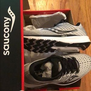 new unworn pair of Saucony women’s running shoes.